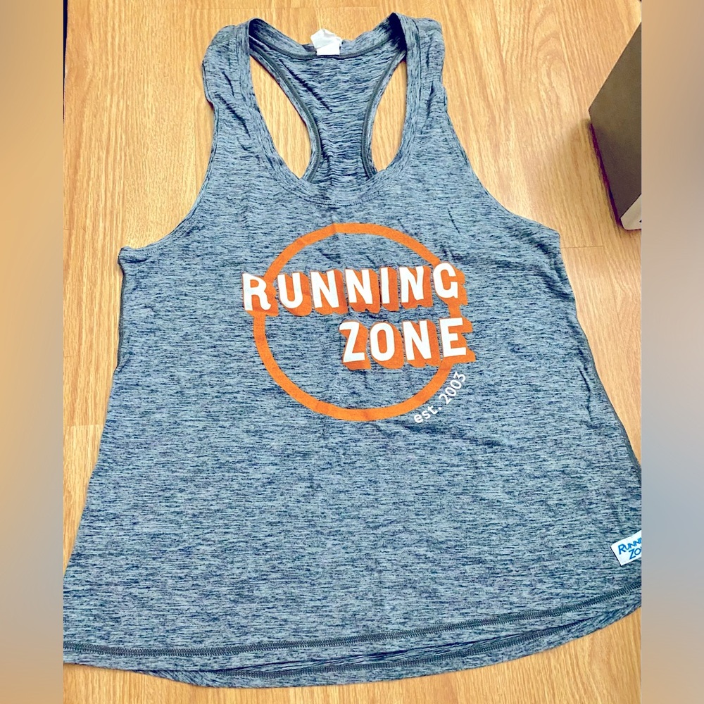 Soft Razorback running zone top. Unisex.